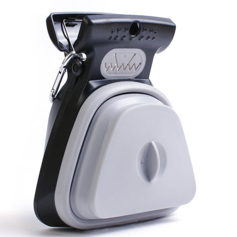Dogs go out with a portable foldable toilet holder to deliver trash bags