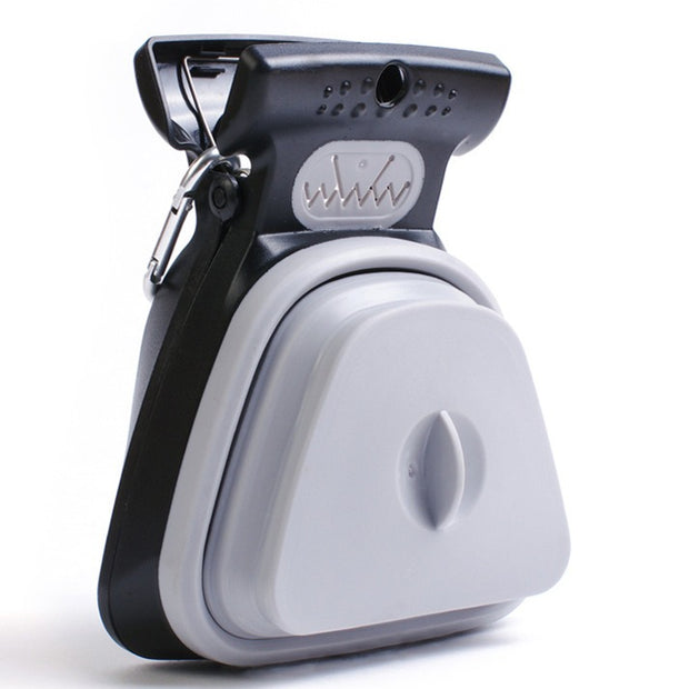 Dogs go out with a portable foldable toilet holder to deliver trash bags